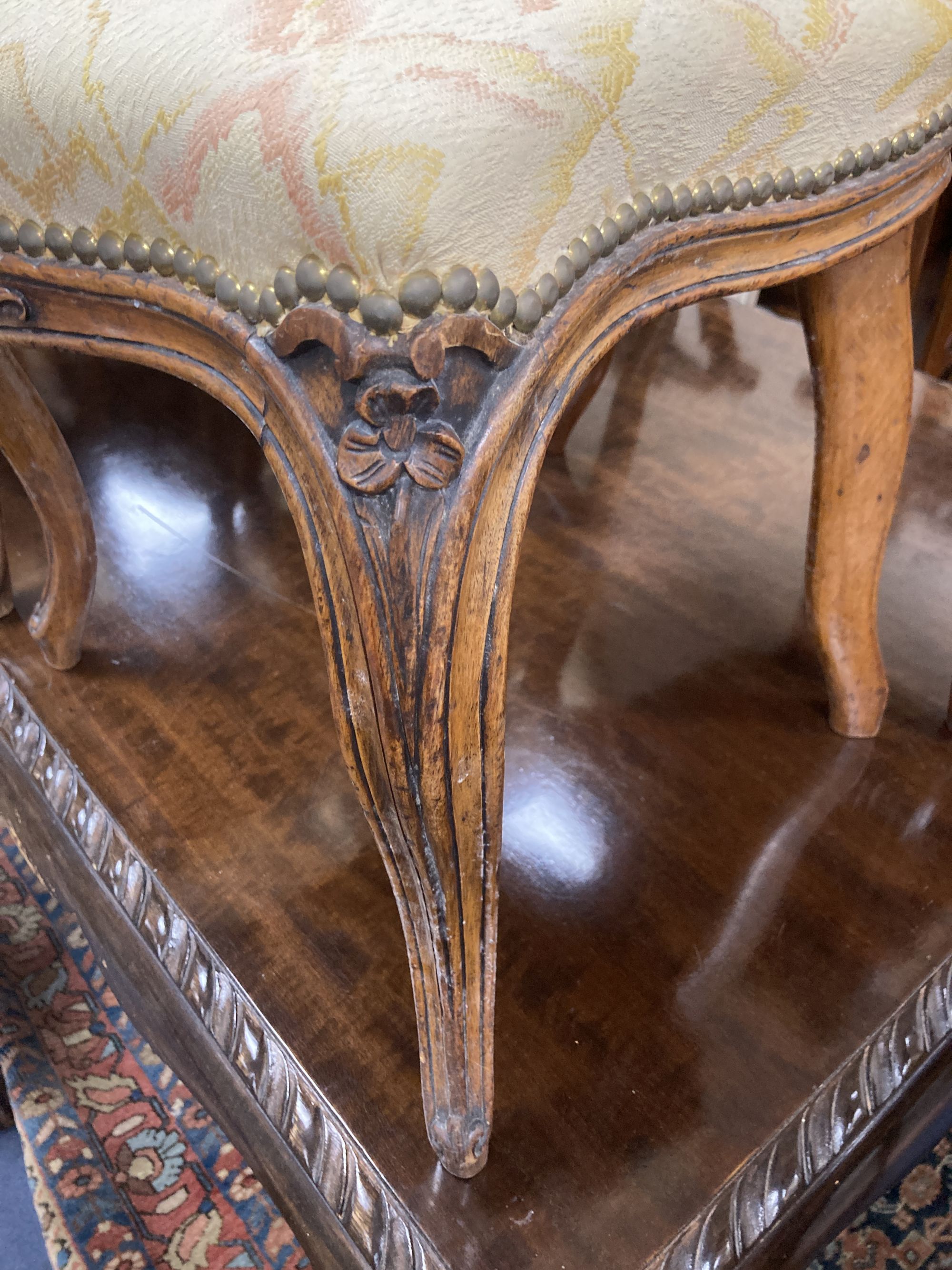 A set of six Louis XV style dining chairs, with cream and pink silk upholstery